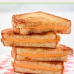 a stack of air fryer grilled cheese sandwich slices.