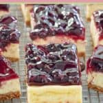 blueberry cheesecake bars with graham cracker crust.