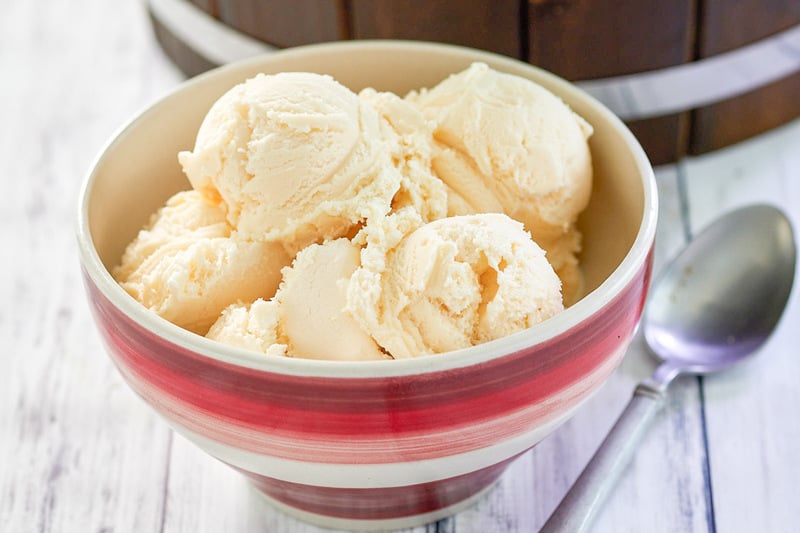 homemade French vanilla ice cream scoops in a bowl.
