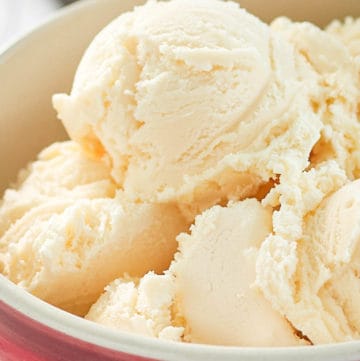 homemade French vanilla ice cream in a colorful bowl.