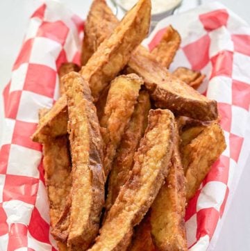 homemade potato wedges and dipping sauce.