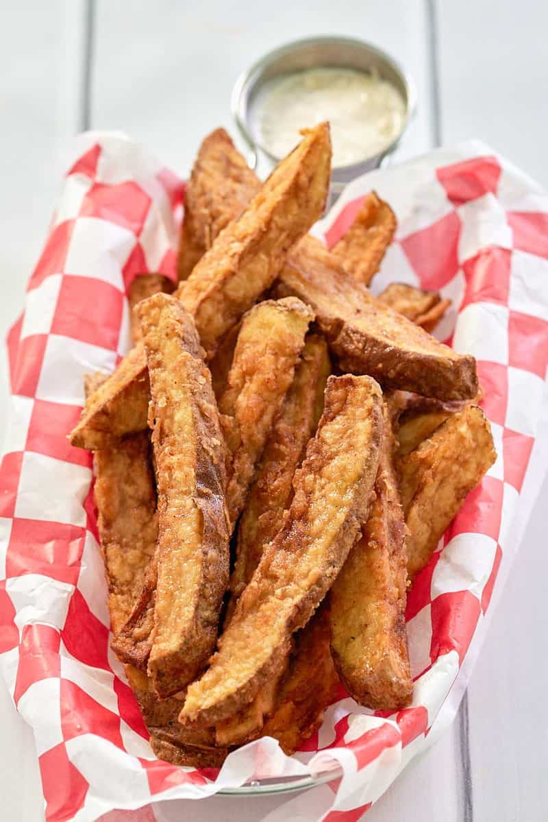 homemade potato wedges and dipping sauce.