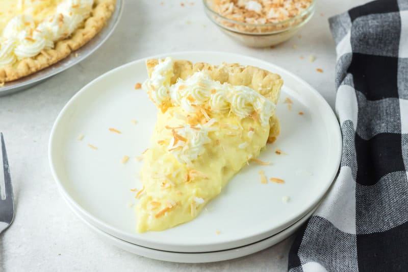 copycat Marie Callender's coconut cream pie slice on a plate.