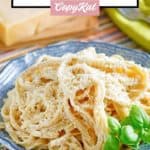 copycat olive garden alfredo sauce and fettuccine in a bowl.