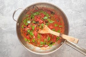 puttanesca sauce in a pan.