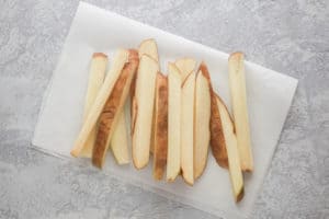 russet potatoes sliced into wedges.