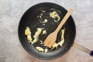 cooked eggs in a skillet.