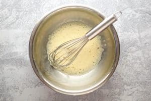 whisked eggs in a mixing bowl.