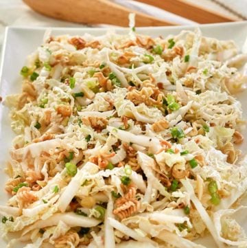 Asian slaw with ramen noodles on a platter.