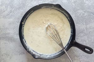 sawmill gravy in a cast iron skillet.