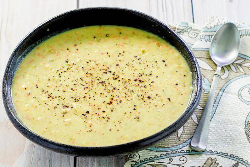 bowl of copycat Dixie Stampede Soup and a spoon.