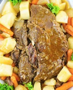 overhead view of Instant Pot pot roast with gravy and vegetables.