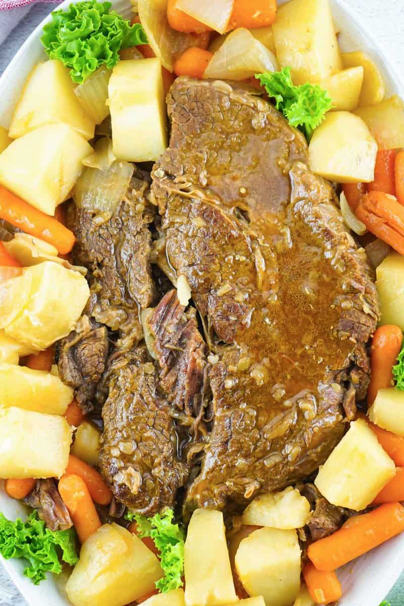 overhead view of Instant Pot pot roast with gravy and vegetables.