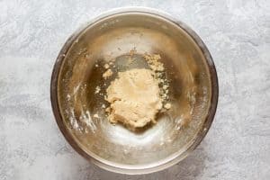 cheesecake crust pastry dough in a mixing bowl.