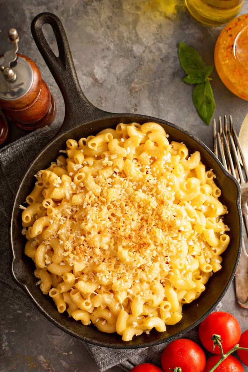 overhead view of macaroni and cheese in a cast iron skillet.
