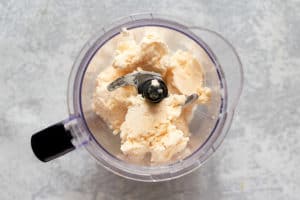 vanilla ice cream and milk in a blender.