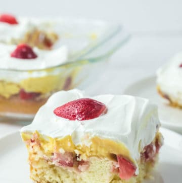 strawberry poke cake slice on a plate.