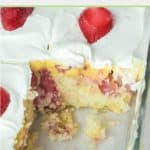strawberry poke cake with a pudding layer in a baking dish.