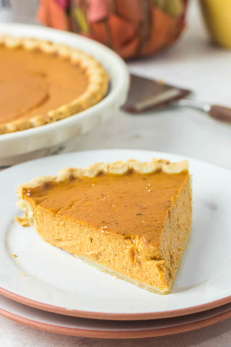 sugar free pumpkin pie slice on a plate.