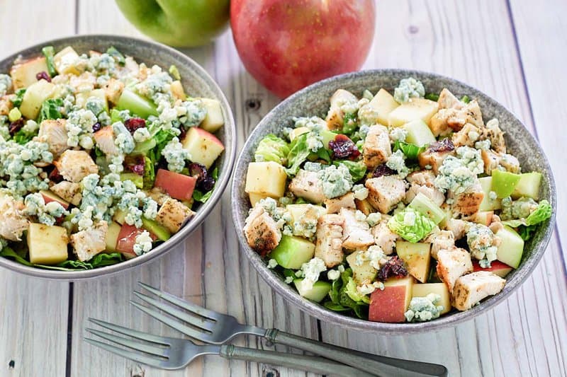 copycat Wendy's apple pecan salad, forks, and apples.