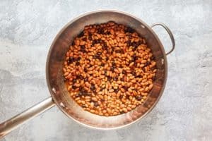 black, pinto, and pork and beans in a pan.