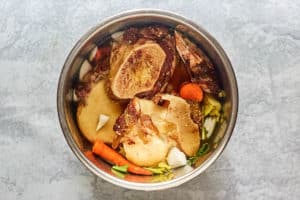 beef bone broth ingredients in an Instant Pot.