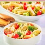bowl of broccoli pasta salad with cheese.