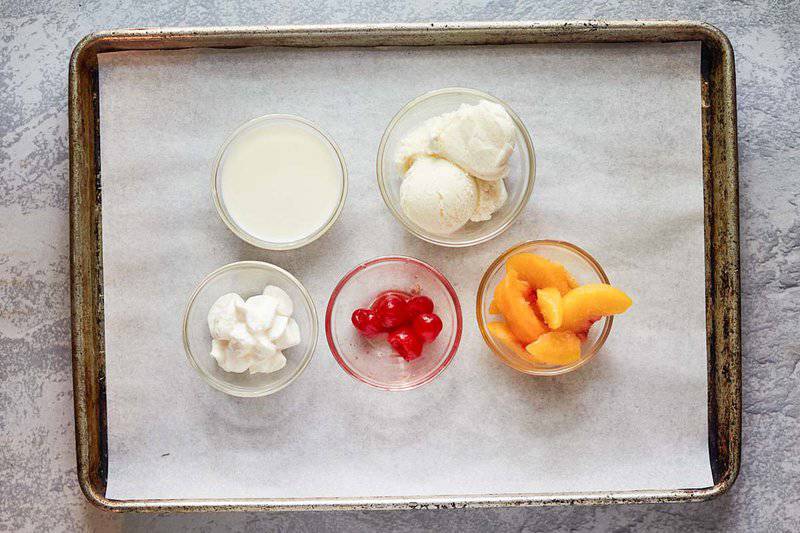 Chick Fil A peach milkshake ingredients on a tray.