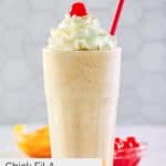 homemade Chick Fil A peach milkshake topped with whipped cream.