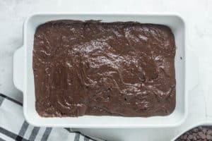 chocolate pudding cake batter in a baking dish.