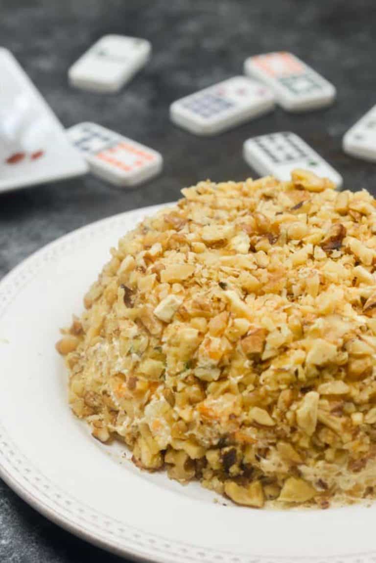 cream cheese ball on a white plate.