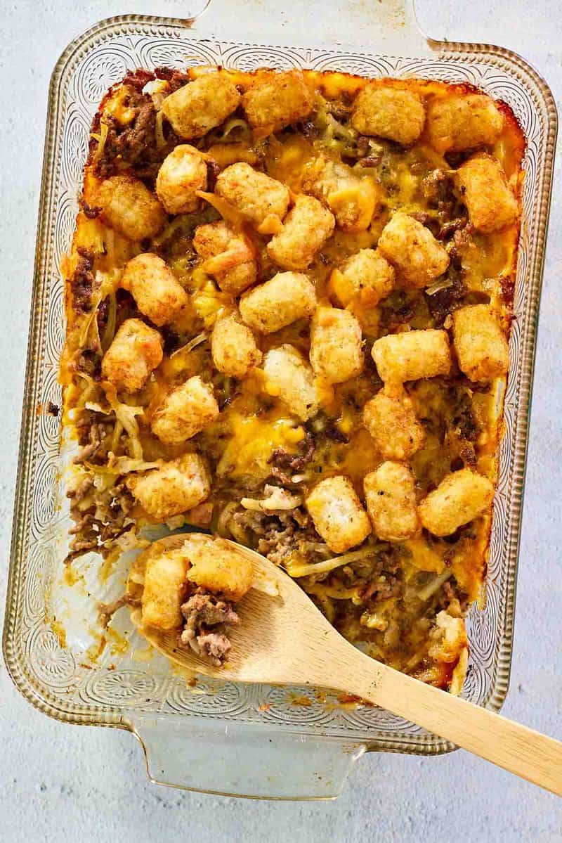 overhead view of hamburger hashbrown casserole with tater tots.