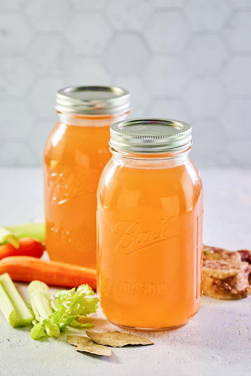 homemade Instant Pot beef bone broth in mason jars.