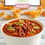 bowl of copycat Instant Pot Wendy's chili and corn chips behind it.