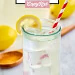 homemade chick fil a lemonade in a glass with a straw.