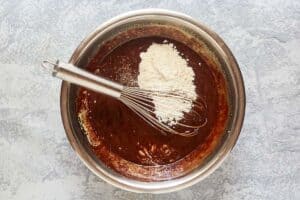 adding flour to Chili's molten lava cake batter.