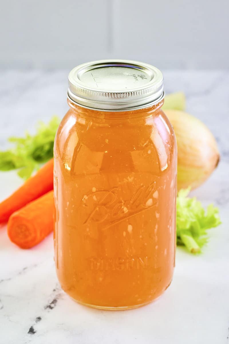 Instant Pot chicken broth, carrots, celery, and onion.