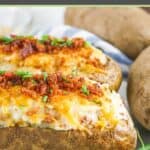 two loaded twice baked potatoes and two russet potatoes.