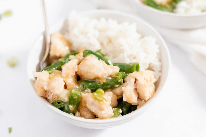 copycat Panda Express string bean chicken and white rice in a bowl.