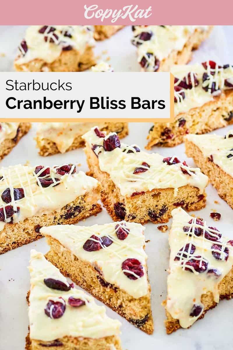 homemade Starbucks cranberry bliss bars on parchment paper.