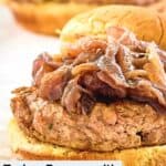 closeup of a turkey burger with caramelized onions.