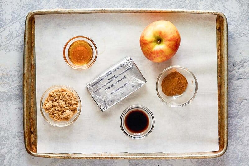caramel apple dip ingredients on a tray.