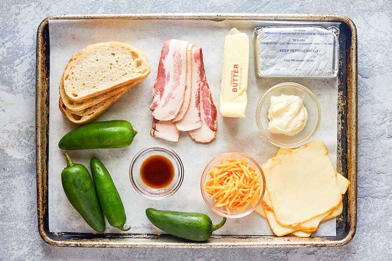 jalapeno popper grilled cheese ingredients on a tray.