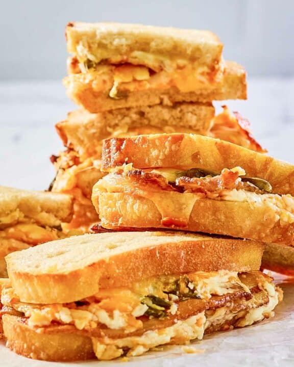 several jalapeno popper grilled cheese sandwiches.