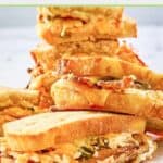 jalapeno popper grilled cheese sandwiches in a stack.
