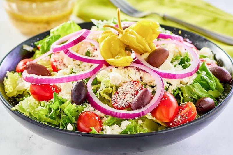 copycat Panera Greek salad with dressing.