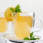 copycat Starbucks medicine ball honey citrus mint tea drink with fresh lemon and mint garnish.
