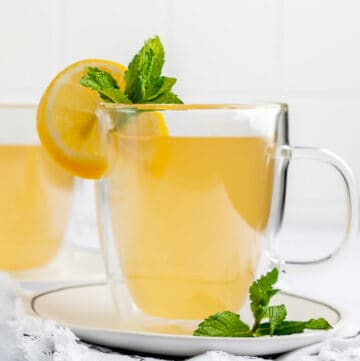 copycat Starbucks medicine ball honey citrus mint tea drink with fresh lemon and mint garnish.