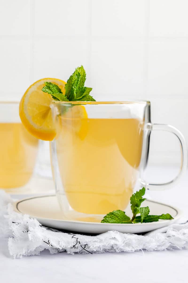 copycat Starbucks medicine ball honey citrus mint tea drink with fresh lemon and mint garnish.