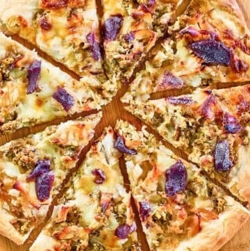 overhead view of Thanksgiving pizza on a pizza peel.